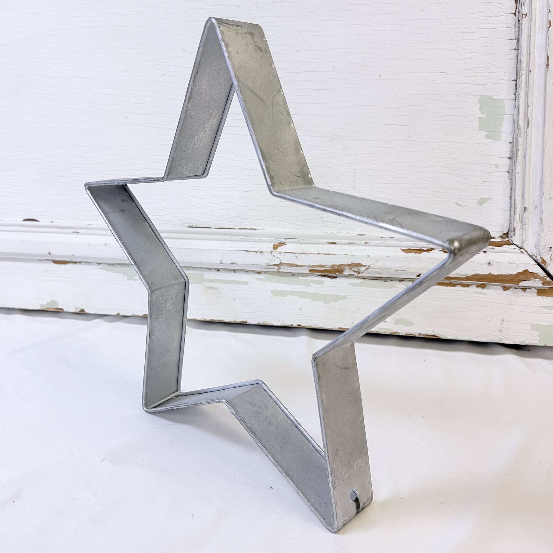 ÉTOILE DE MÉTAL AJOURÉE ARGENT