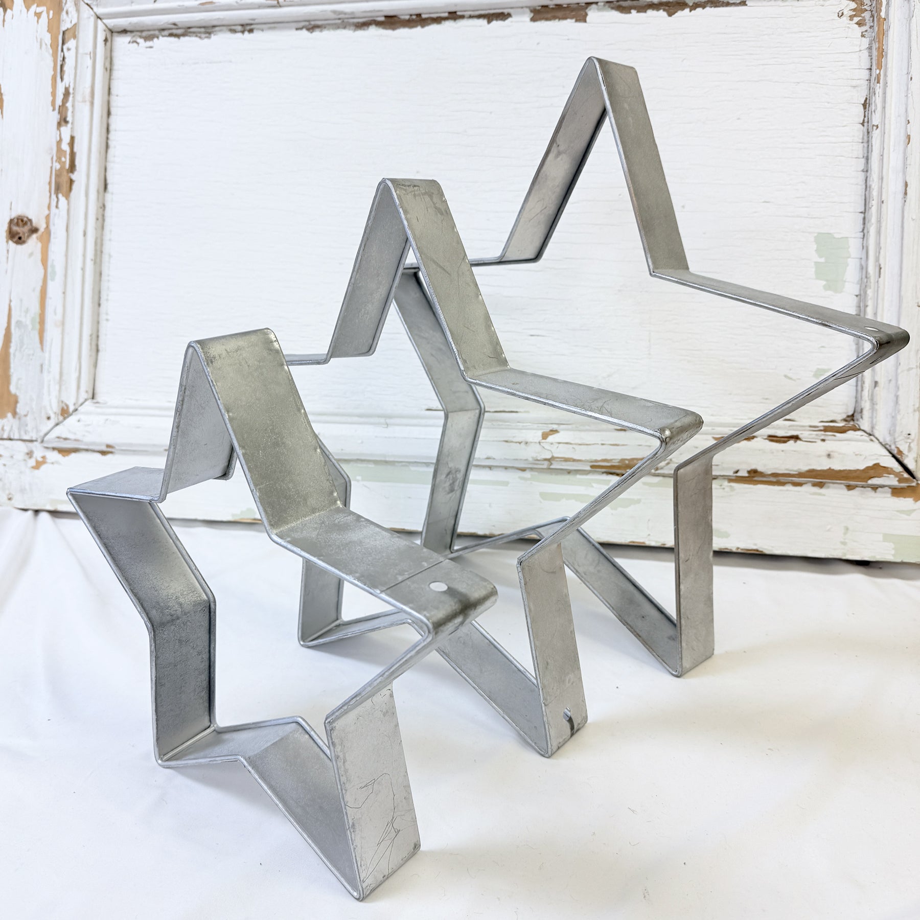 ÉTOILE DE MÉTAL AJOURÉE ARGENT